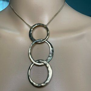 Kenneth Cole bronze necklace with 3 interlocking loops and earings set